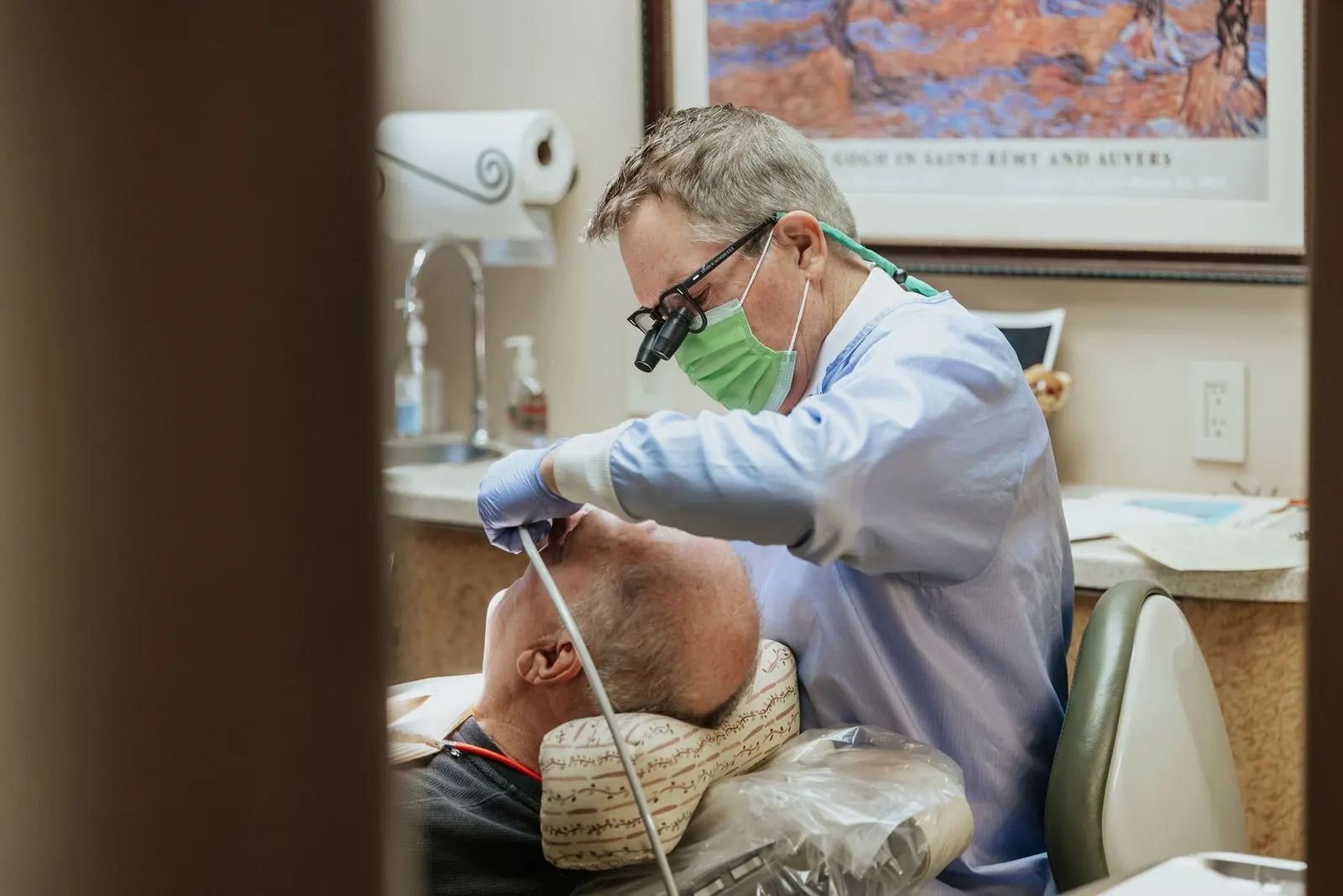 Dr. Steven W. Haywood, DDS treating a patient