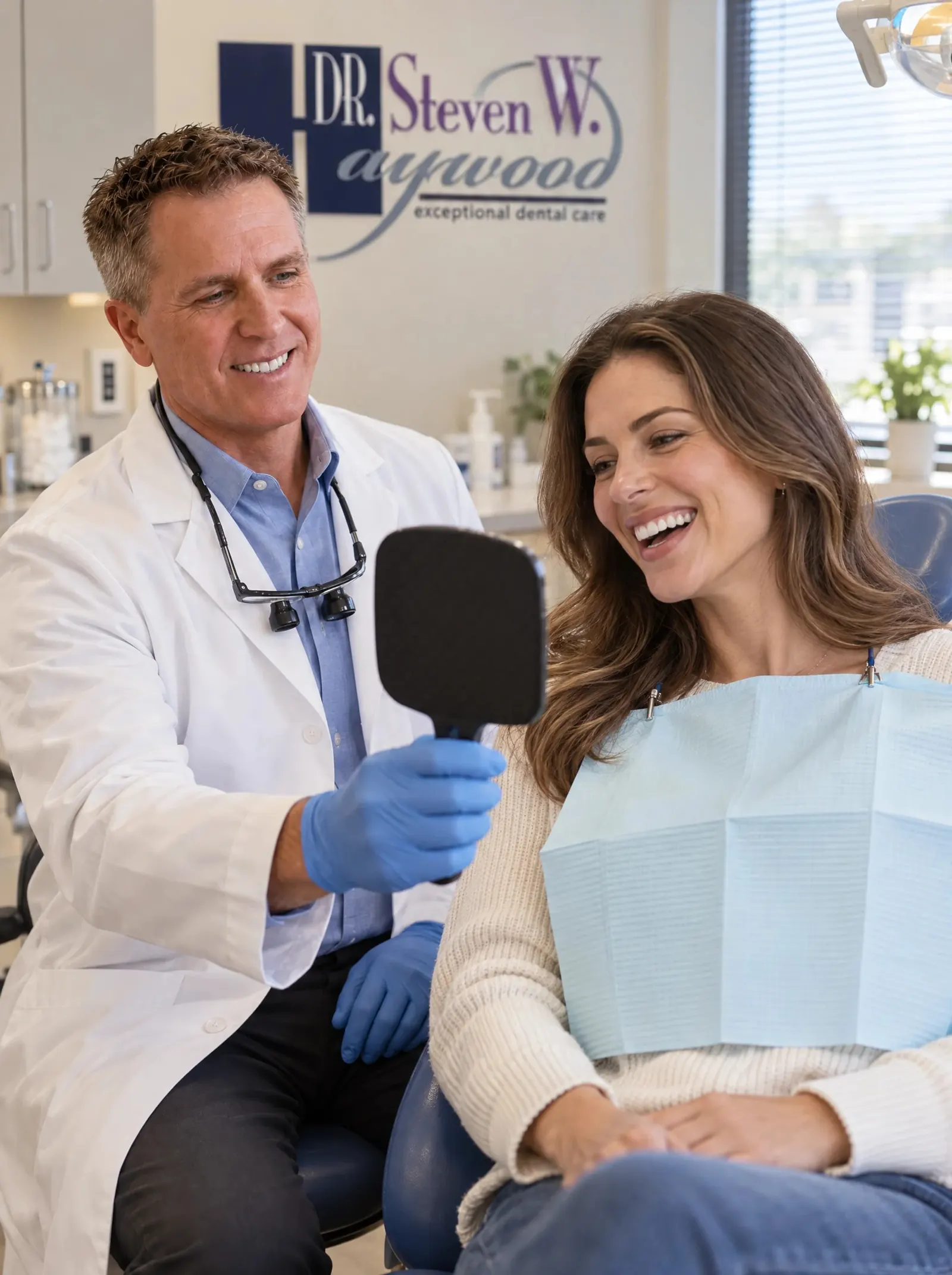 Dr. Steven W. Haywood, DDS with a patient at the Timonium office