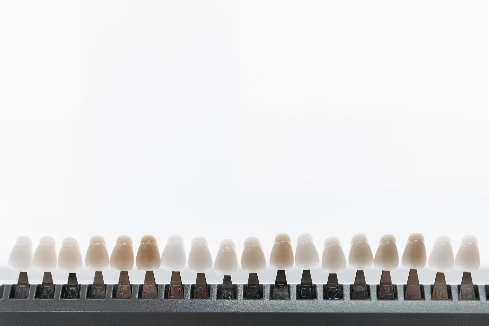 A row of tooth shade guide tabs