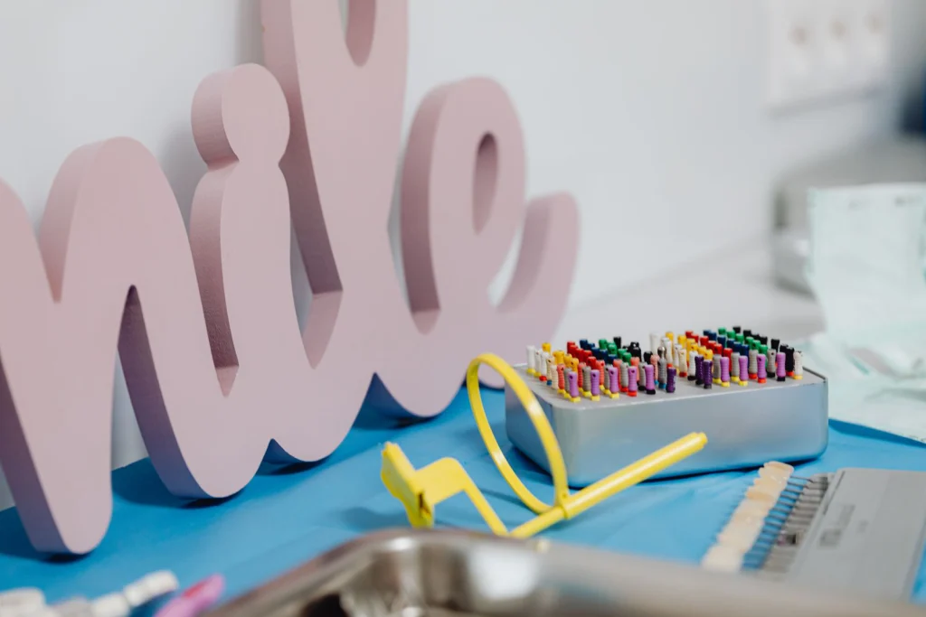 Close-up of dental tools and accessories in a clinic setting, showcasing a modern and clean environment.