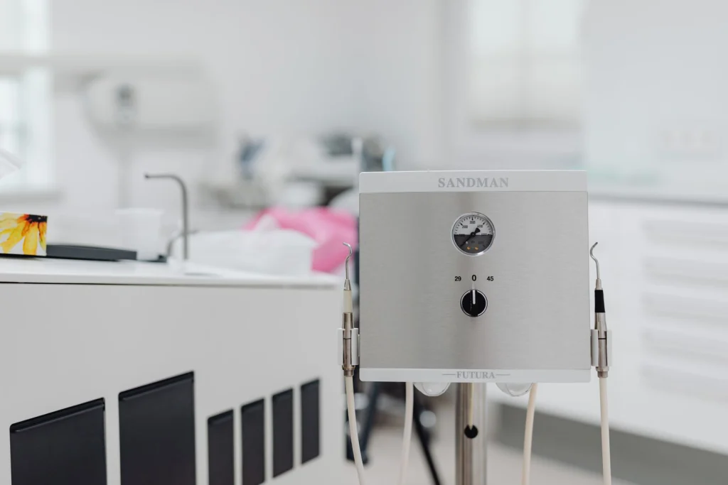 Close-up of dental equipment in a modern, sterile dentist office, highlighting advanced healthcare technology.