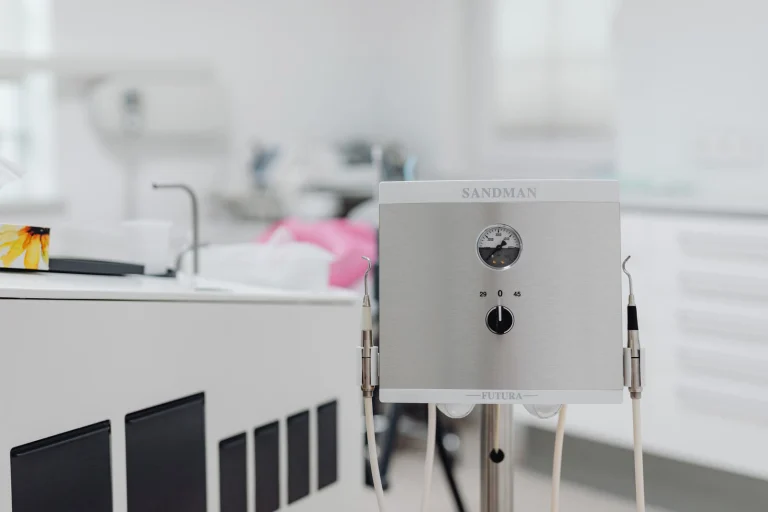 Close-up of dental equipment in a modern, sterile dentist office, highlighting advanced healthcare technology.